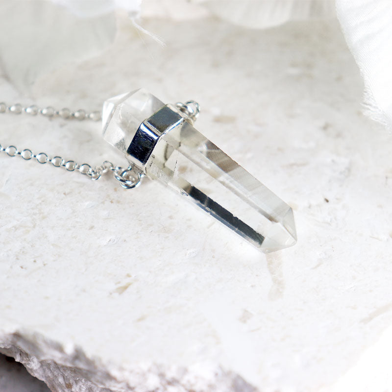 clear quartz point silver necklace