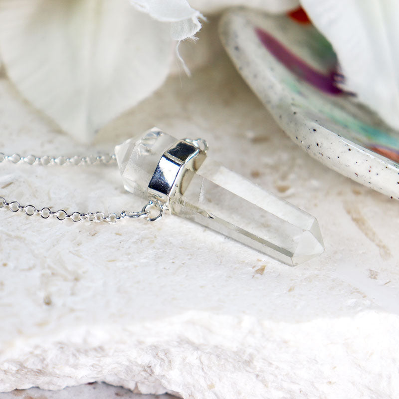 clear quartz point silver necklace