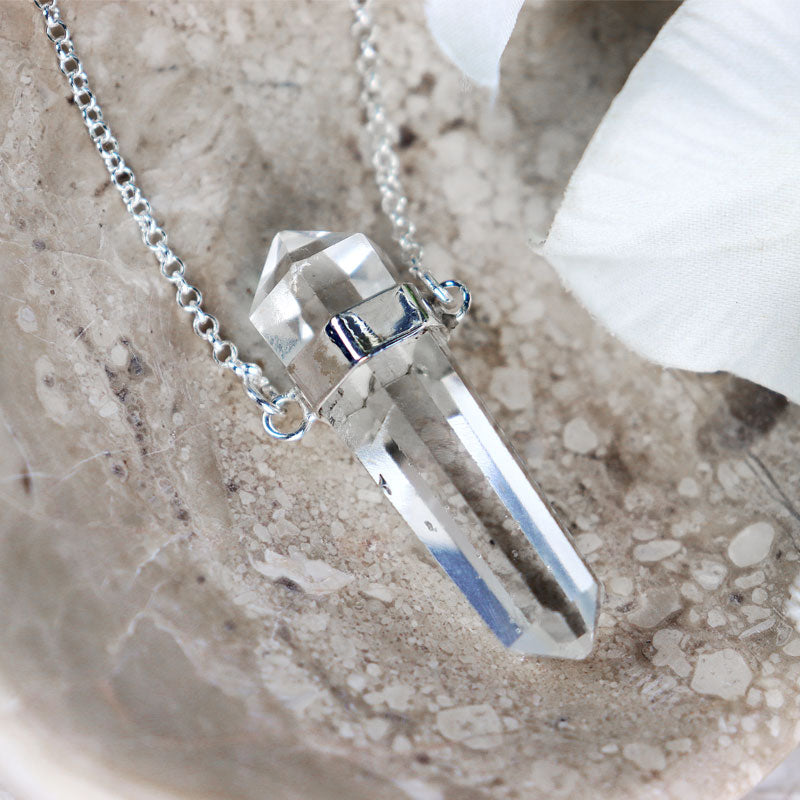 clear quartz point silver necklace