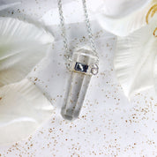 clear quartz point silver necklace