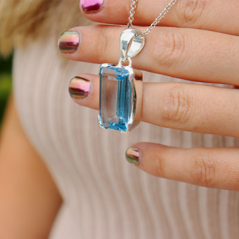 swiss blue topaz sterling silver gemstone pendant